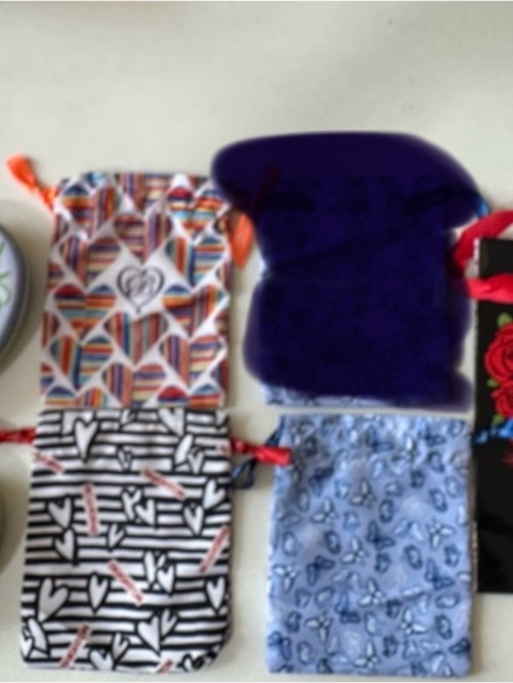 Brighton accessory set, 3 draw string bags, 2 vintage tins & paper bag.